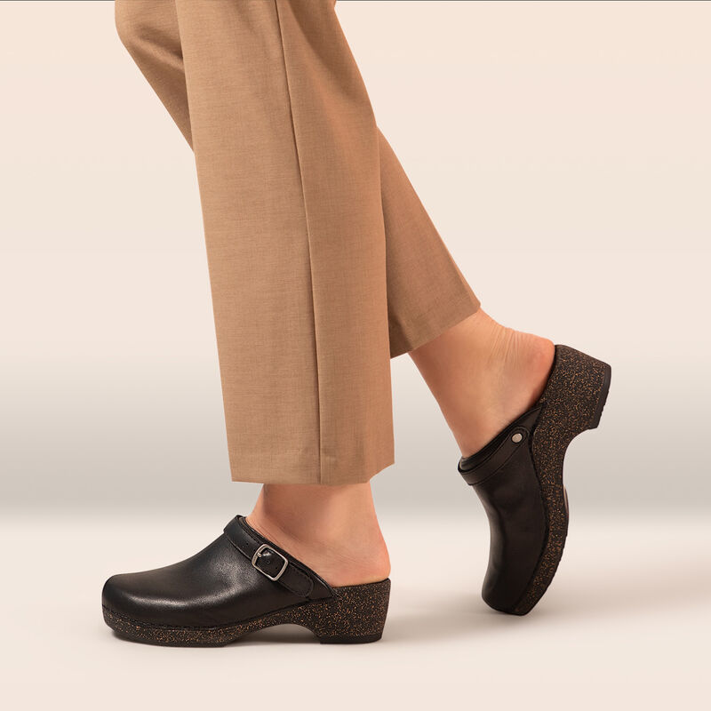 black genuine leather heel clog on foot